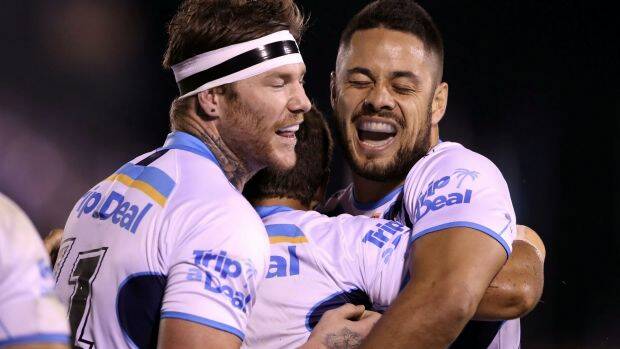Back to his best: Jarryd Hayne celebrates with teammates during their win over the Sharks. Photo: Getty Images