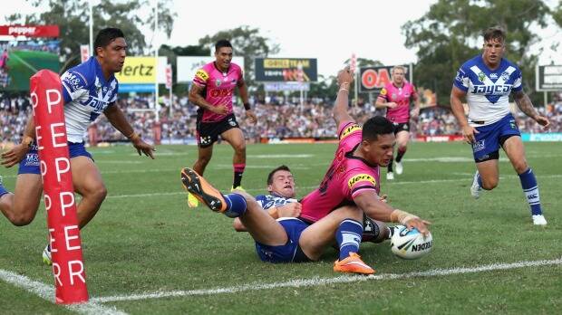 Home and away: Dallin Watene-Zelezniak scores a try at Pepper Stadium. Photo: Cameron Spencer
