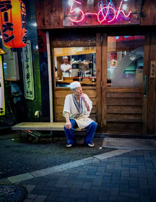 FINALIST: "The head chef taking a break during a busy Friday night in Dotonbori, Osaka's busiest district known for its neon lights and highly competitive restaurant market." Photo: Christine Arnaldi