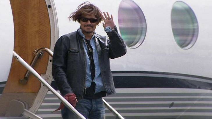 Johnny Depp arrives at Brisbane Airport on his way to the Gold Coast to resume shooting Pirates of the Caribbean: Dead Men Tell No Tales. Photo: Kendall Gilding/Seven News