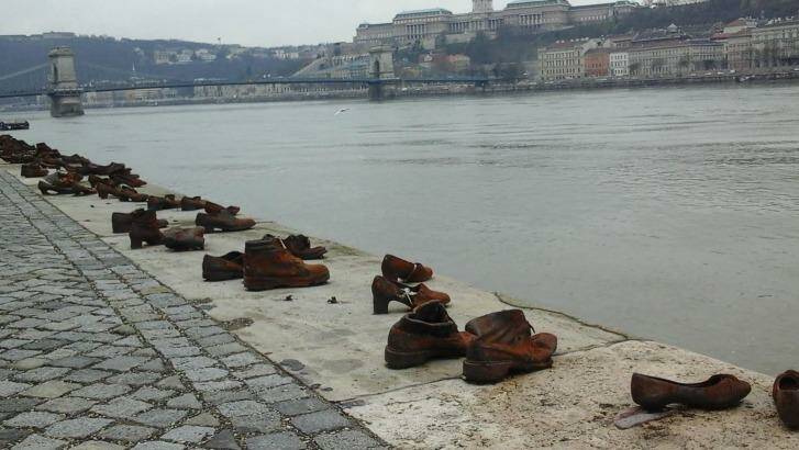 Shoes line the bank of the Danube River in Budapest in a memorial to Jewish victims in Hungary during World War II conceived by film director Can Togay. Photo: Helen Womack