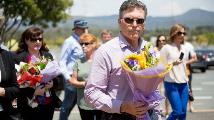 BRISBANE, AUSTRALIA - OCTOBER 28: Dreamworld chief executive Craig Davidson leave flowers at the site on Friday after a private memorial service at Dreamworld October 28, 2016 in Brisbane, Australia. (Photo by Tammy Law/Fairfax Media) Photo: Tammy Law