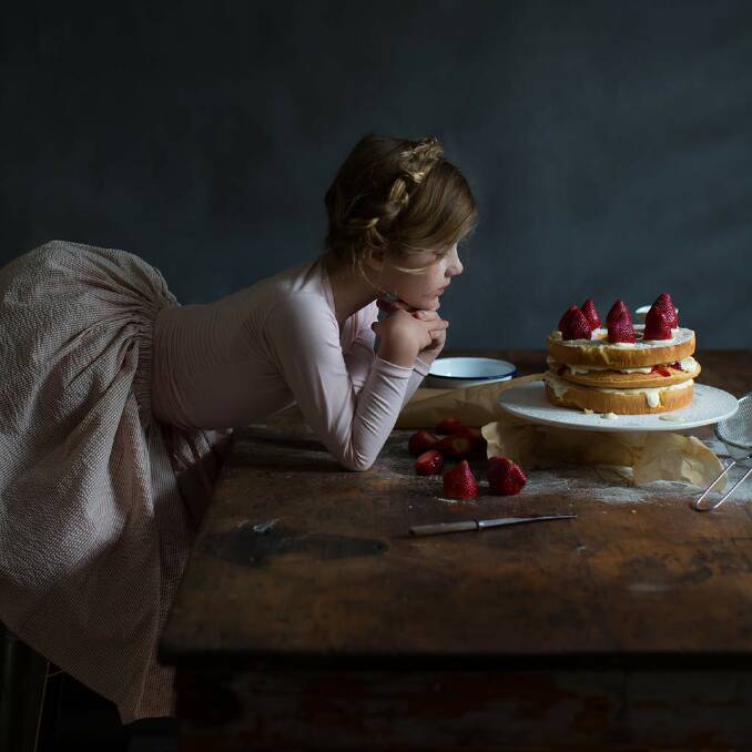 FINALIST: "The birthday cake" - portrait of the photographer's daughter Billie Vidulich. "The boys in our family had their birthdays so the girls baked them a cake. That's love. x" Photo: Maya Vidulich