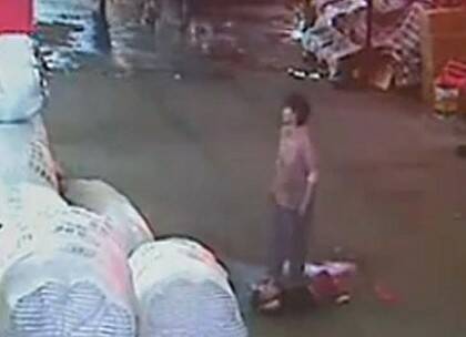 Yueyue, the Chinese toddler run over by two vehicles, was tended to by a trash collector.