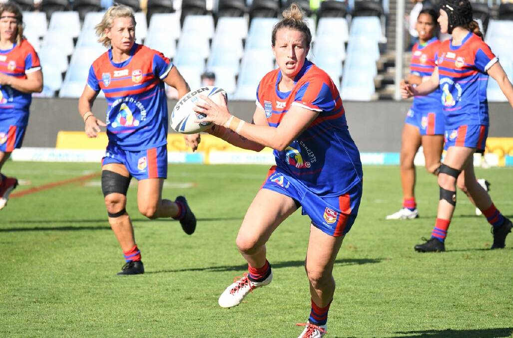 Holli Wheler on the move for CRL Newcastle in a NSW Women's Premiership match. Kylie Hilder is in the background. 