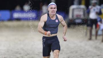 Elouera's gold medallist beach sprinter Michael Hanna is now the Australian champion on the sand. Picture John Veage