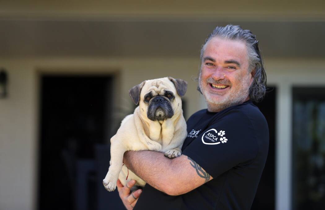 Dynamic duo: Chris Russell and his beloved frug Daisy. Picture: Chris Lane