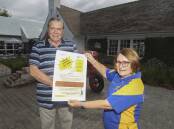 Camden Rotary's Cliff Reece and Judith Humphreys at Camden Valley Inn, which has put up one of the auction items. Picture: Simon Bennett