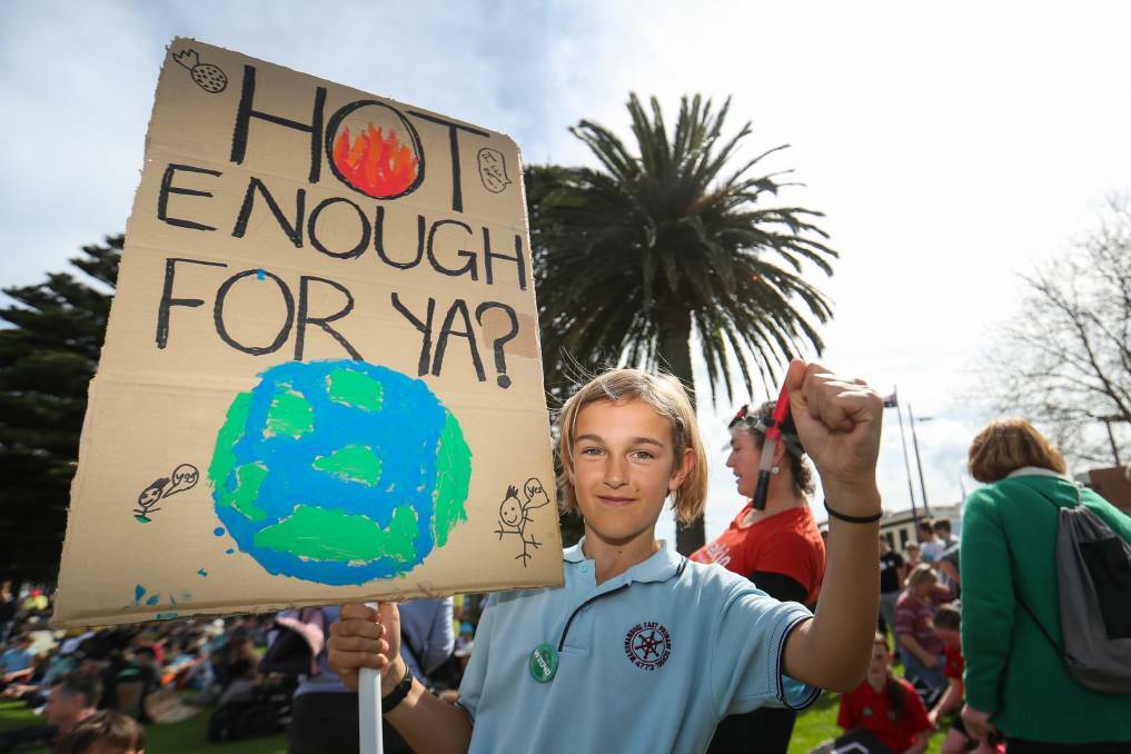 WARRNAMBOOL: Jarrah Crabbnor, 10, displays his sign at the climate strike. Photo: Morgan Hancock
