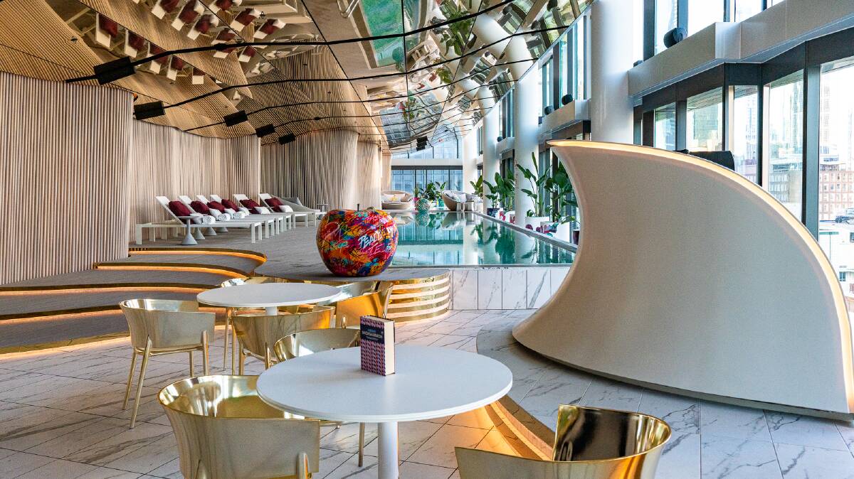 The indoor pool and bar at the new W Hotel Melbourne. Pictures: Michael Turtle
