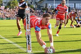 Zac Lomax scores the first try for the Dragons against Wests Tigers at Campbelltown. Picture NRL Images