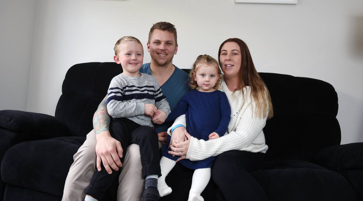 GRIEVING: Josh and Danielle Courtney with their children Xavier, 4, and Charlotte, 2, are helping others as they deal with the grief of losing their son Lucas. Picture: Kate Healy