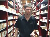 Ryan working in one of the Tynan warehouses. Picture supplied