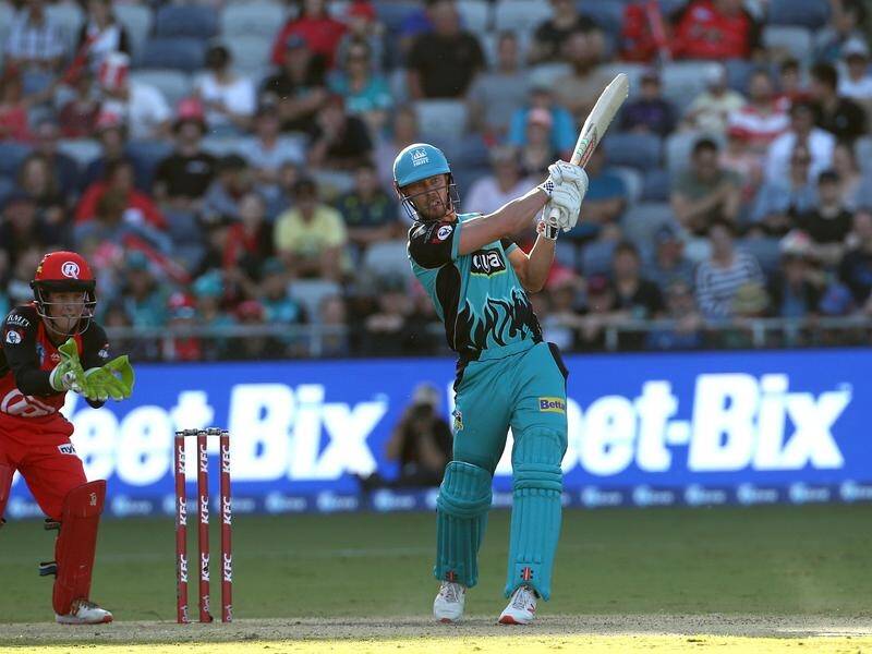 Chris Lynn smashes another delivery for the Brisbane Heat in the BBL clash against the Renegades.