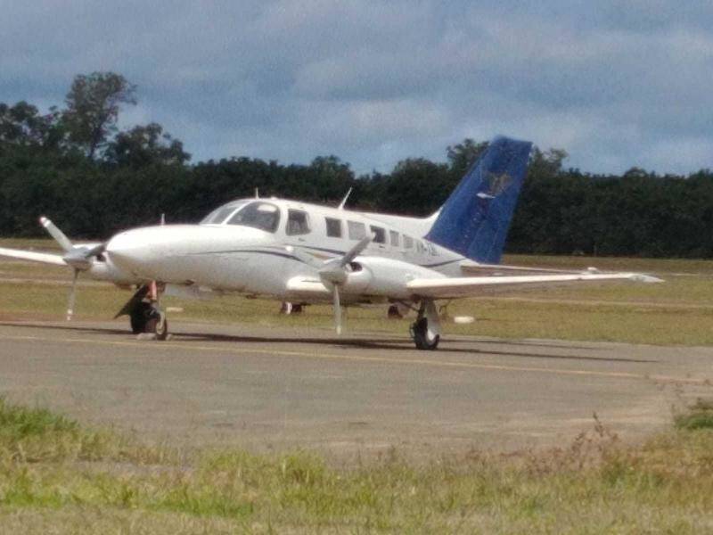 Two men charged over a plane load of cocaine that crashed in PNG have been denied bail.