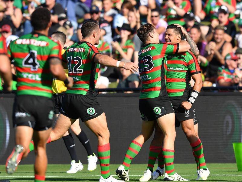 Cody Walker (R) has bagged four tries in South Sydney's 28-24 comeback NRL win over the Warriors.