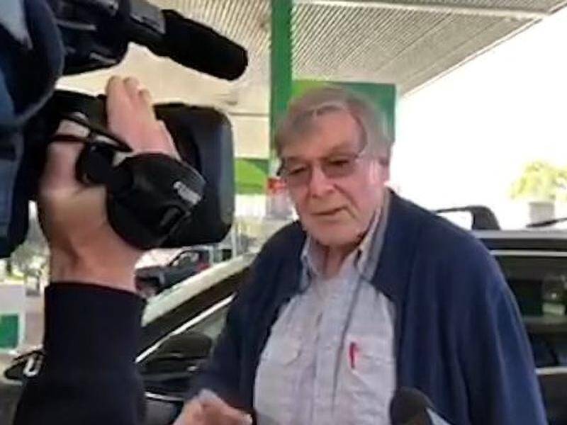 George Pell stopped at a Glenrowan petrol station after leaving Melbourne following his acquittal.