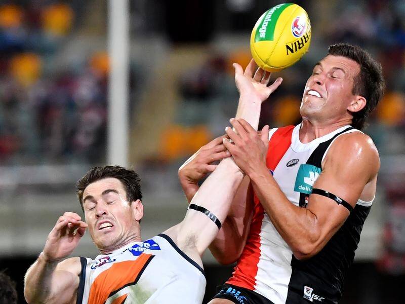 Giant Jeremy Cameron (l) and the Saints' Rowan Marshall contest the ball in Friday's AFL clash.