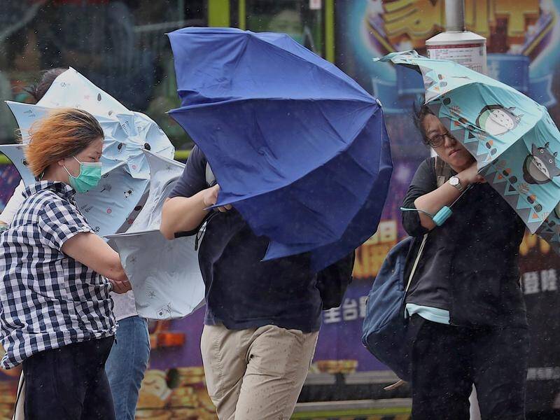 Tropical Storm Bailu brought heavy rain and winds as it crossed the southern half of Taiwan.