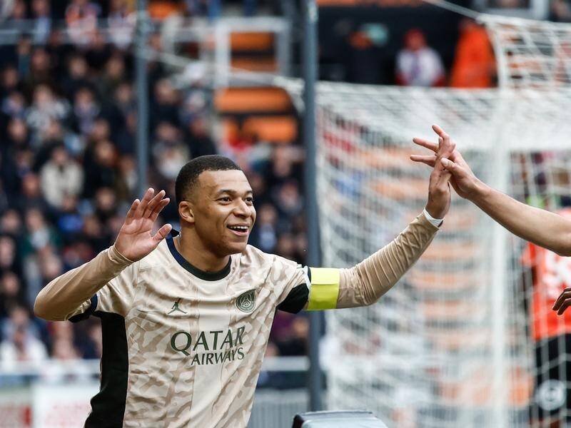 Kylian Mbappe celebrates after scoring PSG's second goal in their 4-1 win at Lorient. (EPA PHOTO)