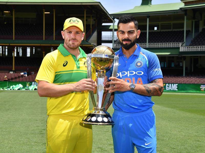 Aaron Finch (L) is happy to let officials decide if it's safe for an Aussie ODI tour of Pakistan.