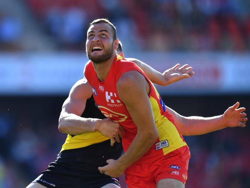 Gold Coast ruckman Jarrod Witts has re-signed with the Suns through to 2024.
