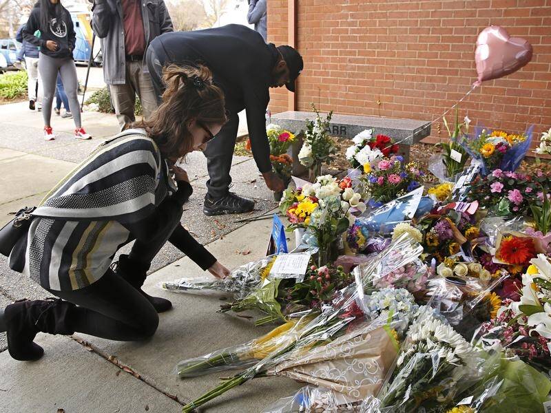 Flowers laid at the Davis Police Department in California for slain police officer Natalie Corona.