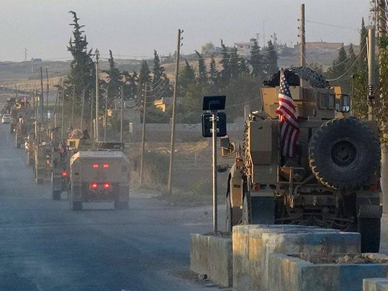 US troops have began withdrawing from their positions along Turkey's border in Syria.