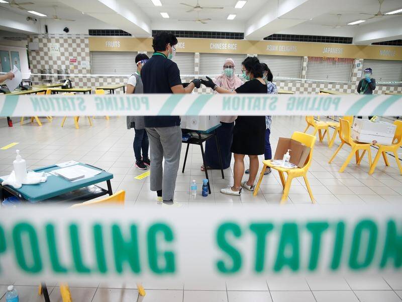 Singapore is holding its national elections, with strict rules to prevent the spread of COVID-19.