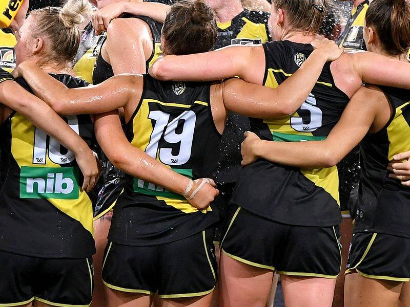Richmond are waiting for advice from authorities after an AFLW player tested positive for COVID-19.