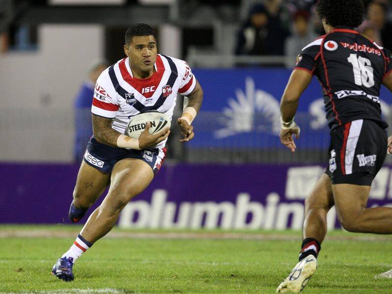 Mose Masoe carting the ball up for the Sydney Roosters during the 2013 NRL season.