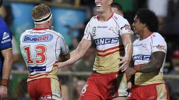 Dolphins winger Jack Bostock (second right) is all smiles after his hat-trick against Parramatta. (HANDOUT/NRL PHOTOS)