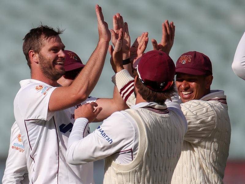 Mark Steketee (l) took a career-best 7-44 in Queensland's Shield match against SA in Adelaide.