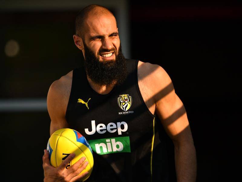 Bachar Houli has been cleared to play in next weekend's AFL grand final.