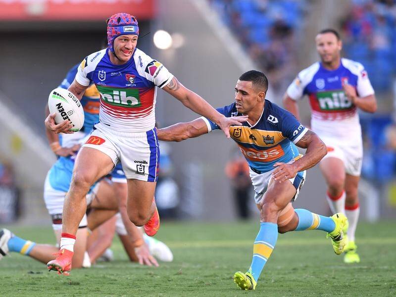 Kalyn Ponga (l) had mixed fortunes on his return to NRL action for Newcastle against the Titans.