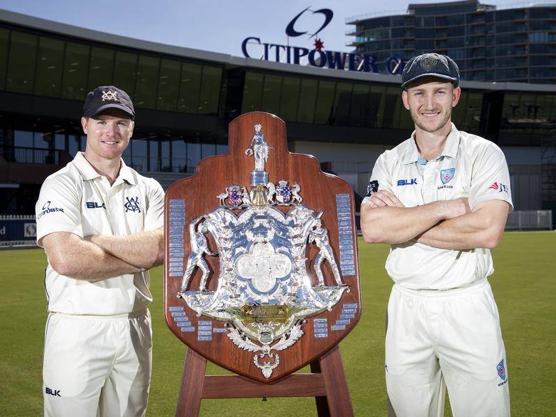 Victoria skipper Travis Dean (left) and NSW's Peter Nevill are yet to finalise their line-ups.