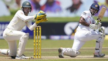 Australian wicketkeeper Alex Carey has impressed with the gloves, and bat, on the tour of Sri Lanka.