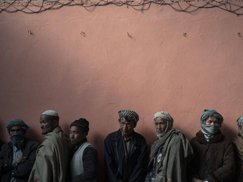 The West must prop up Afghan banks or the entire financial system could collapse, the UN says.