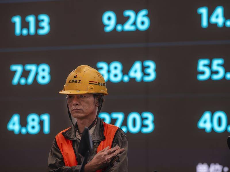 World shares dipped after data showed slower-than-expected growth in China's economy.