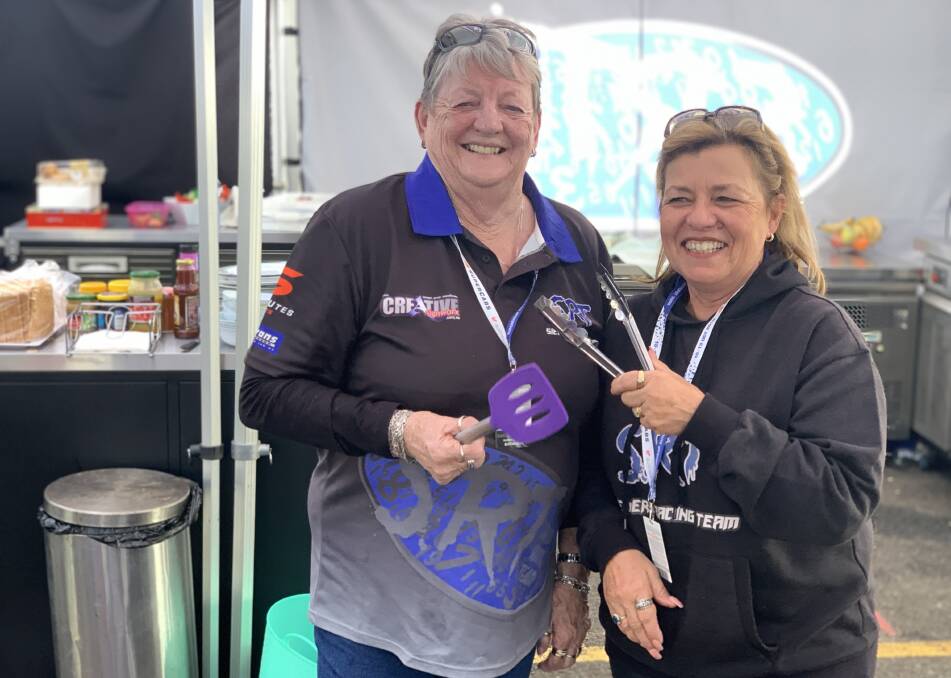 ON THE TOOLS: Sylvia Crupland and Chris Sieders are in the hospitality team for Sieders Racing Team and keep 30 people fed right across the day. Photo: NADINE MORTON 101019nmsieders1